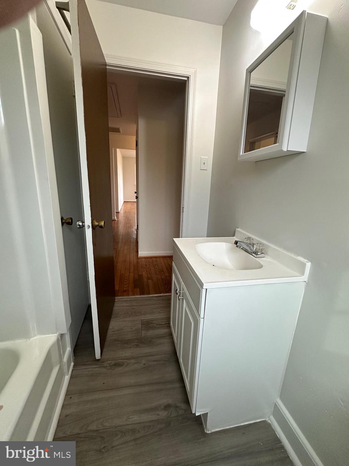14835 Rock Point Road Newburg, MD 20664 - Photo 10 of 13 a view of bathroom with a sink and mirror