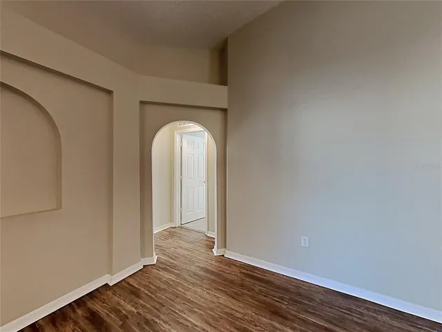 a view of entryway with wooden floor