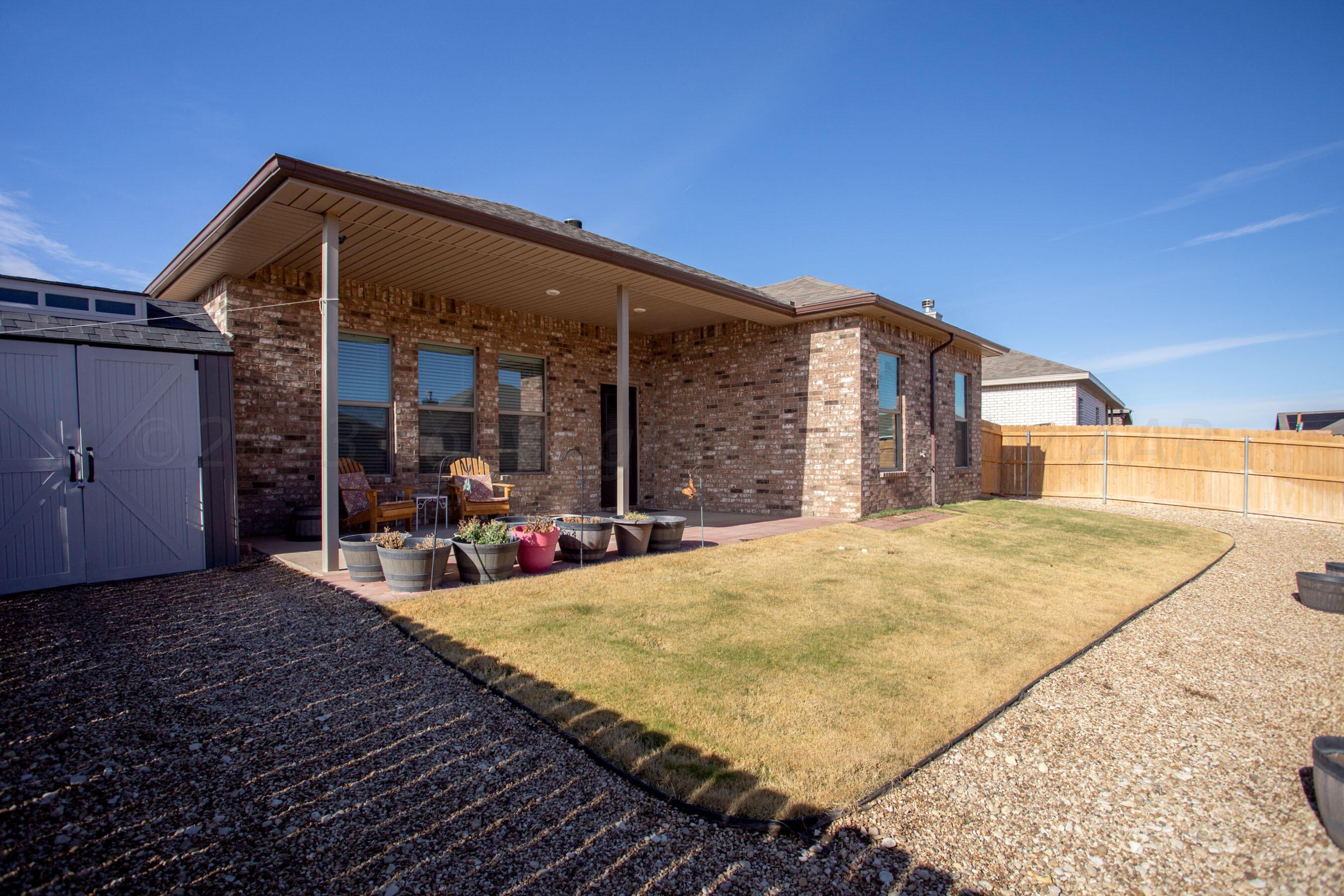 7811 Bellamy Drive Amarillo, TX 79119 - Photo 22 of 24 a view of a house with patio