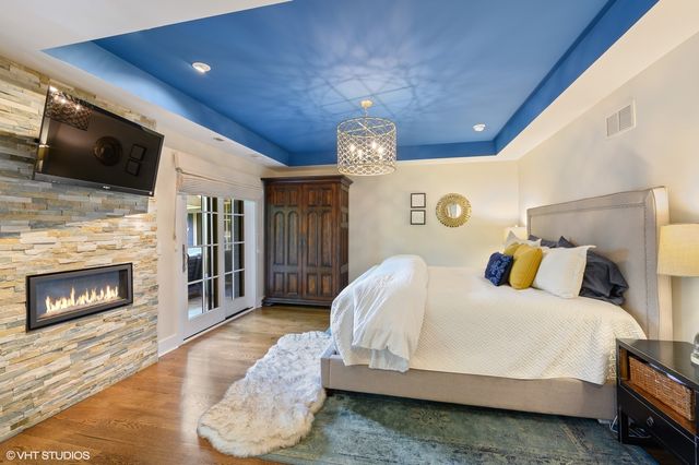 a bathroom with a double vanity sink and mirror