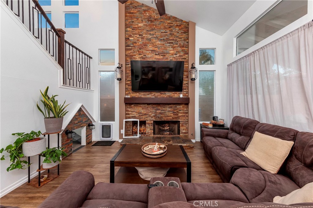 28630 Oak Valley Road Castaic, CA 91384 - Photo 12 of 54 a living room with furniture and a fireplace