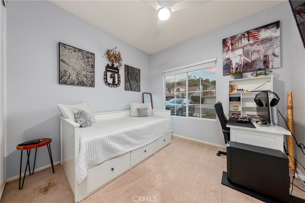 28630 Oak Valley Road Castaic, CA 91384 - Photo 20 of 54 a bedroom with furniture and a window