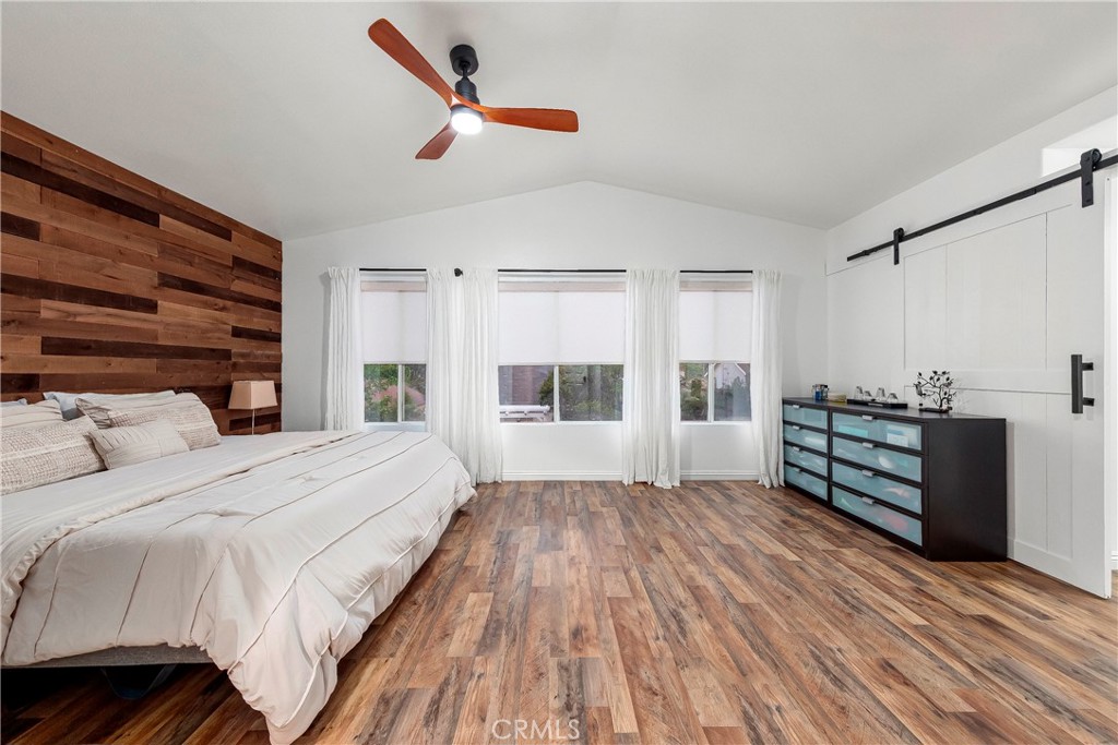 28630 Oak Valley Road Castaic, CA 91384 - Photo 24 of 54 a spacious bedroom with a bed and a dresser