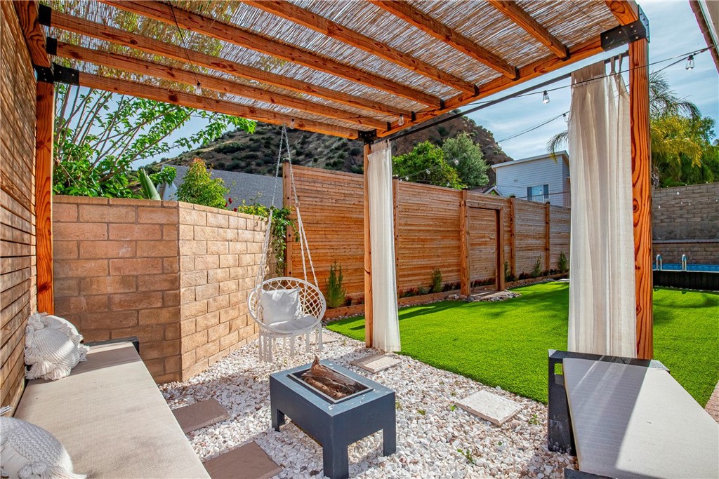 28630 Oak Valley Road Castaic, CA 91384 - Photo 38 of 54 a backyard of a house with seating space