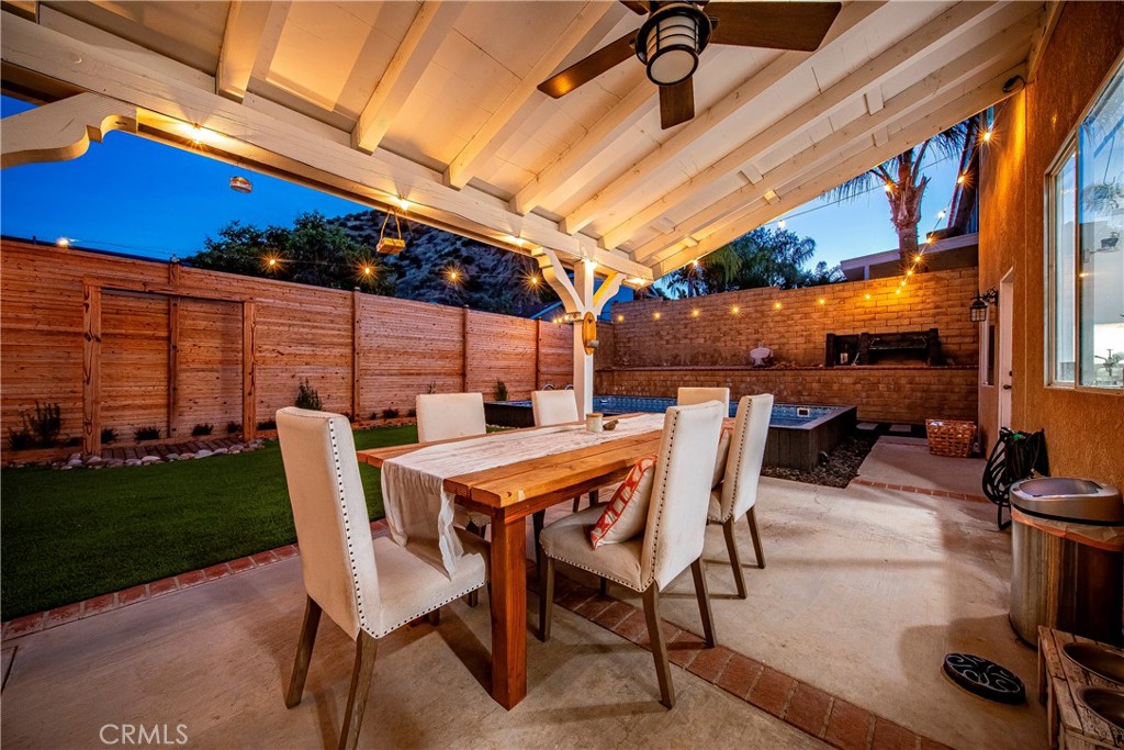 28630 Oak Valley Road Castaic, CA 91384 - Photo 47 of 54 a view of a patio with a table and chairs
