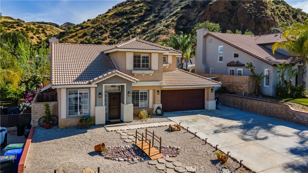 28630 Oak Valley Road Castaic, CA 91384 - Photo 49 of 54 a view of a house with a yard