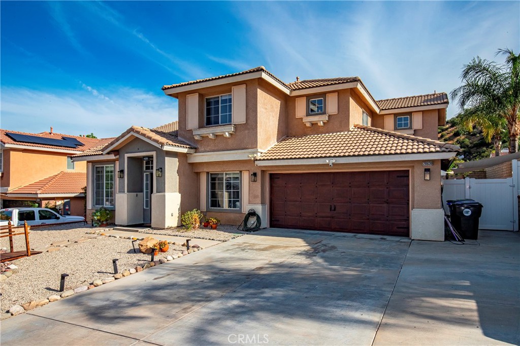 28630 Oak Valley Road Castaic, CA 91384 - Photo 50 of 54 a front view of a house with a yard
