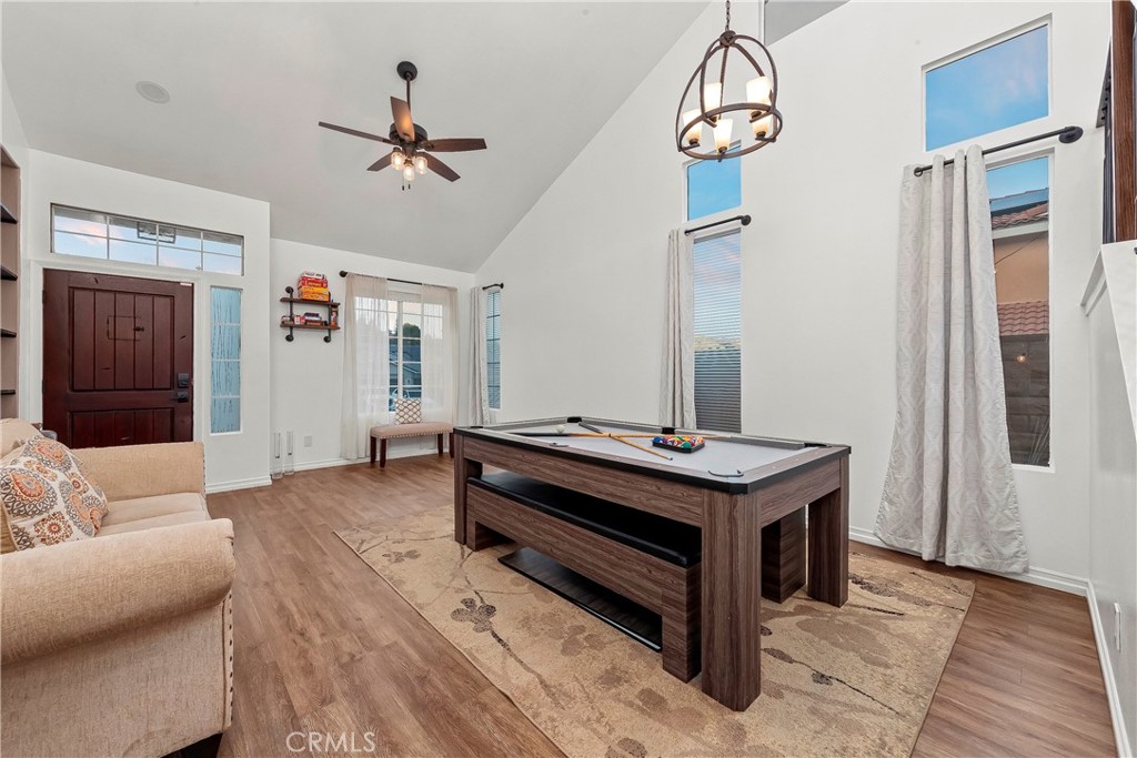 28630 Oak Valley Road Castaic, CA 91384 - Photo 8 of 54 a room with furniture and a chandelier