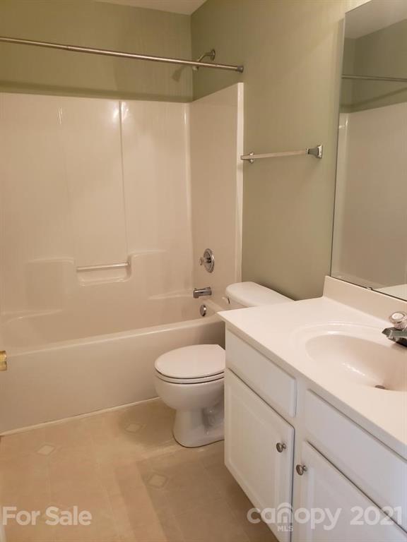 708 Shellstone Place Fort Mill, SC 29708 - Photo 22 of 24 a bathroom with a toilet a sink and bathtub