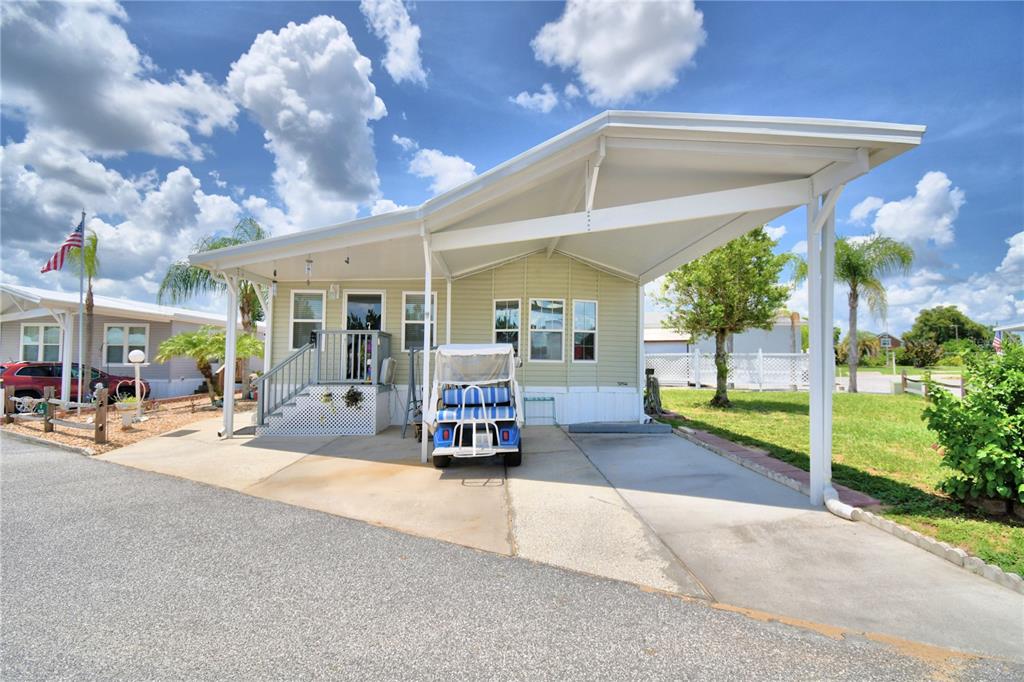 a view of a house with sitting area and porch area