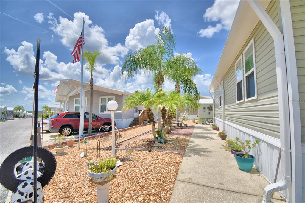 251 Patterson Road, Unit I58 Haines City, FL 33844 - Photo 4 of 52 a view of a chairs and table in a patio