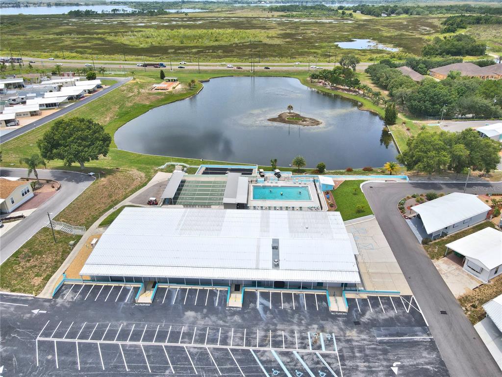 251 Patterson Road, Unit I58 Haines City, FL 33844 - Photo 47 of 52 a view of a swimming pool with an outdoor space