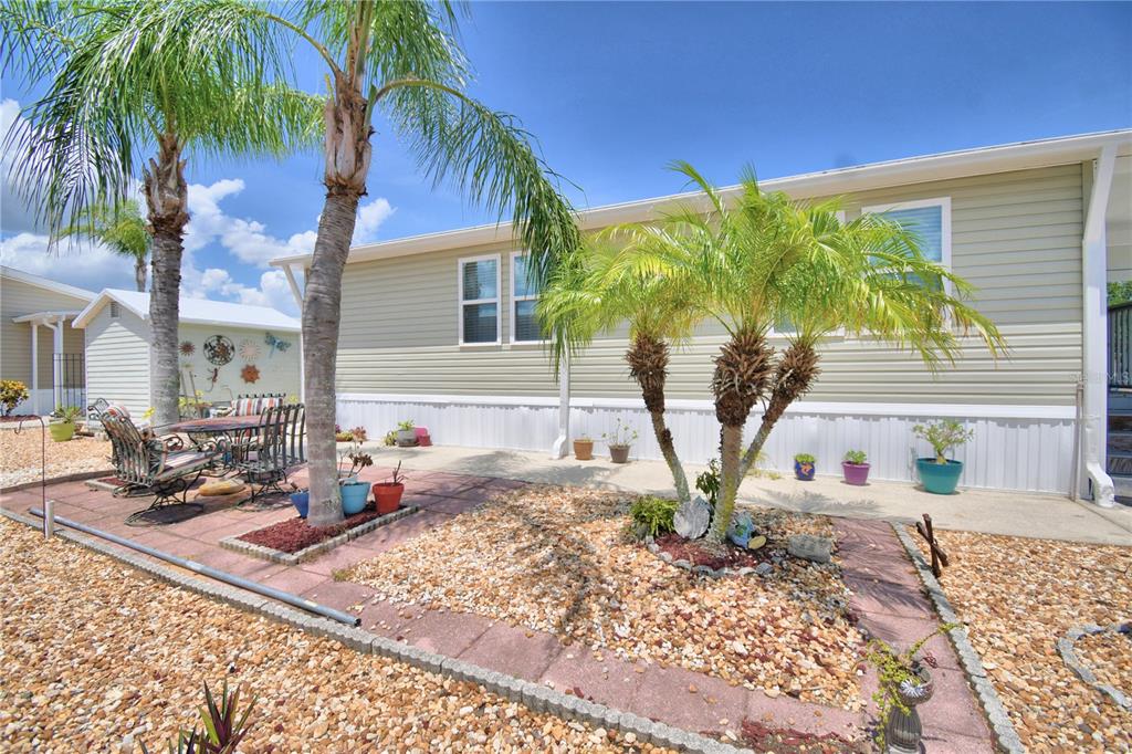 251 Patterson Road, Unit I58 Haines City, FL 33844 - Photo 8 of 52 a view of a house with backyard and sitting area