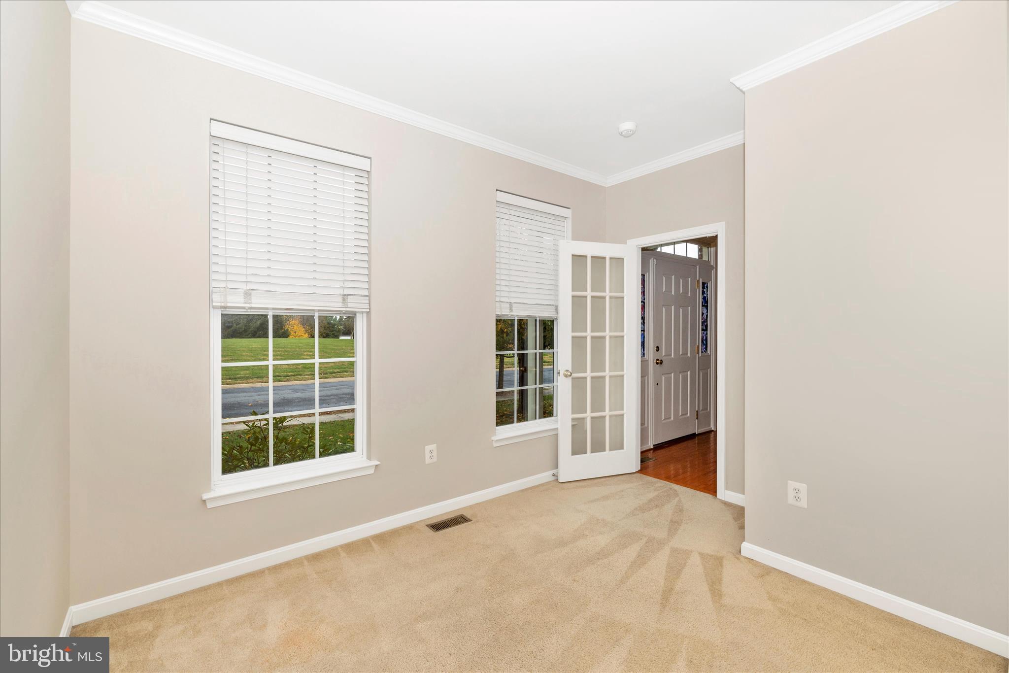 102 Sunlight Drive Frederick, MD 21702 - Photo 21 of 65 an empty room with windows