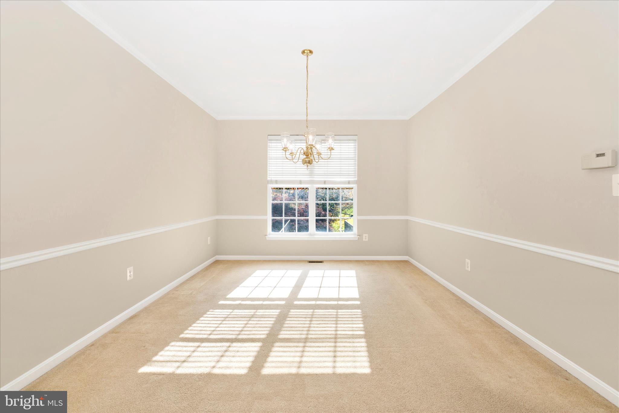 102 Sunlight Drive Frederick, MD 21702 - Photo 24 of 65 a view of an empty room with a window