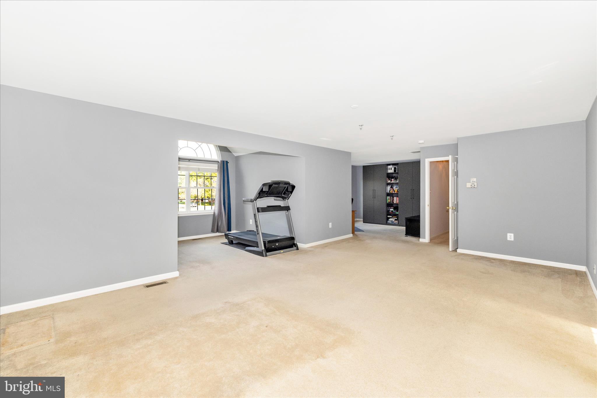 102 Sunlight Drive Frederick, MD 21702 - Photo 30 of 65 an empty room with furniture and a window