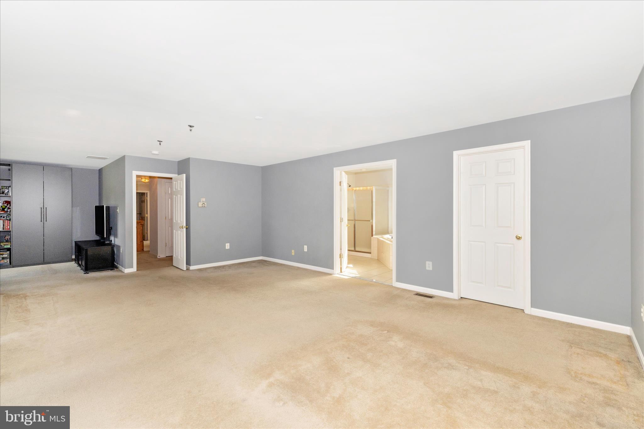 102 Sunlight Drive Frederick, MD 21702 - Photo 31 of 65 a view of an empty room with closet and a bathroom