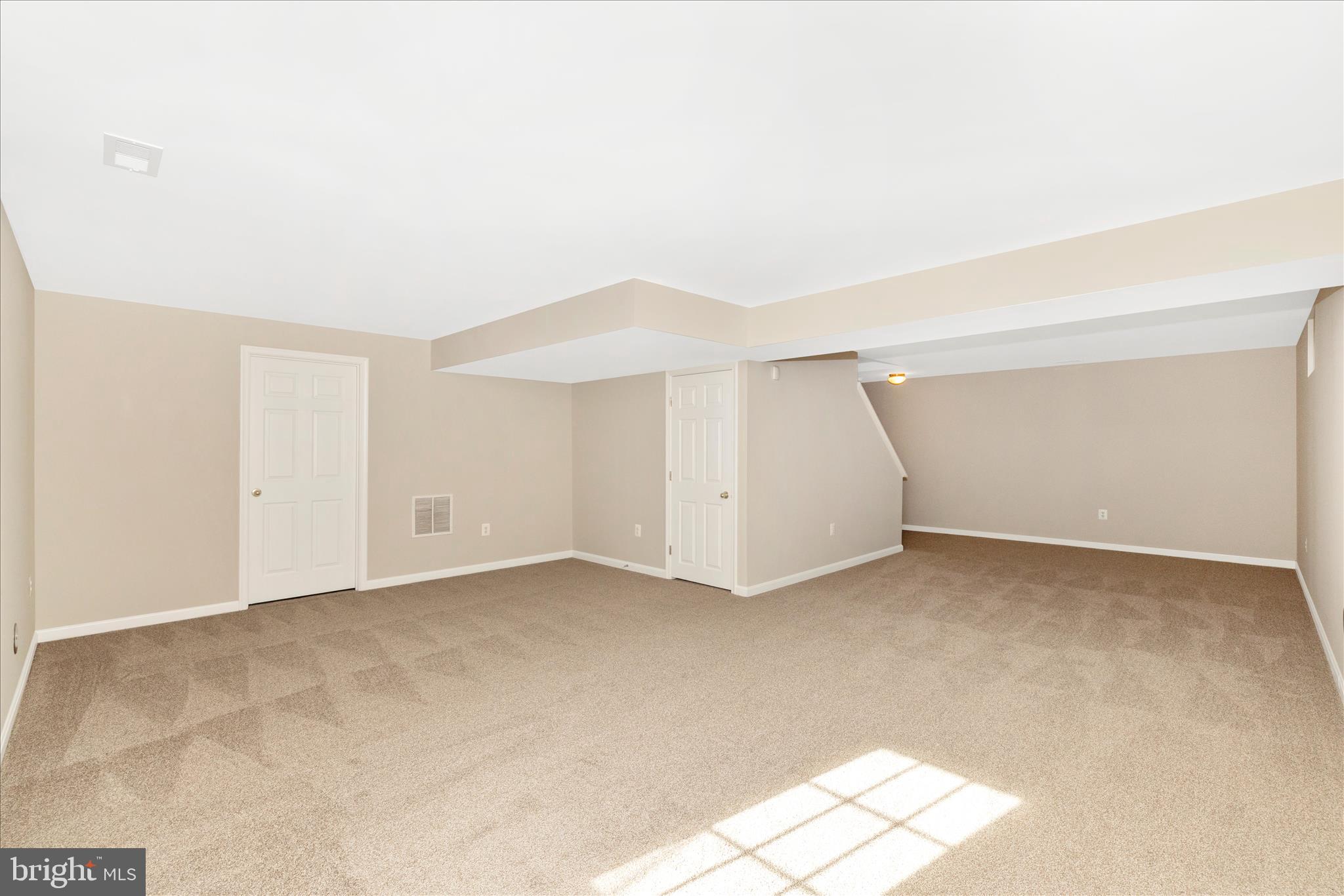 102 Sunlight Drive Frederick, MD 21702 - Photo 46 of 65 an empty room with a natural light