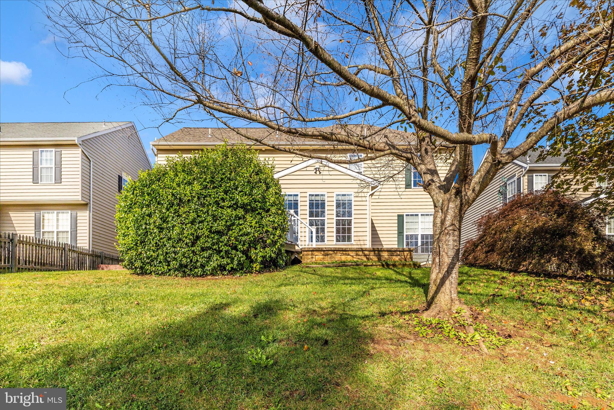 102 Sunlight Drive Frederick, MD 21702 - Photo 55 of 65 a view of a yard in front of a house with a large tree