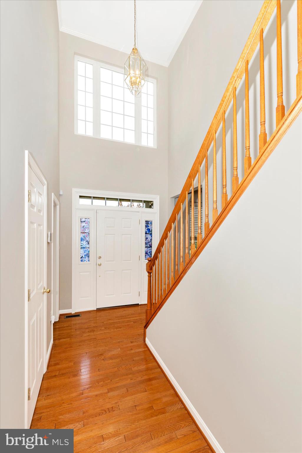 102 Sunlight Drive Frederick, MD 21702 - Photo 6 of 65 a view of an entryway with wooden floor