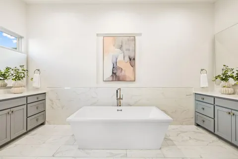 a bathroom with a sink and a bathtub