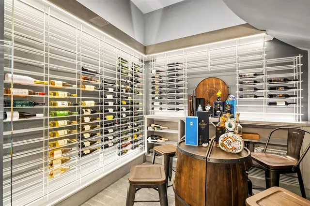 a front view of a house with outdoor seating