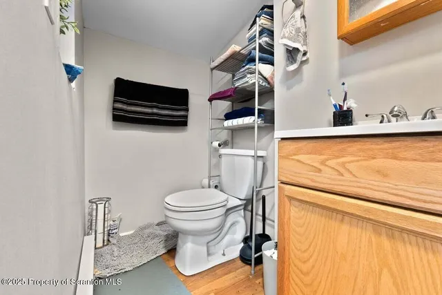 a living room with lots of furniture and toys