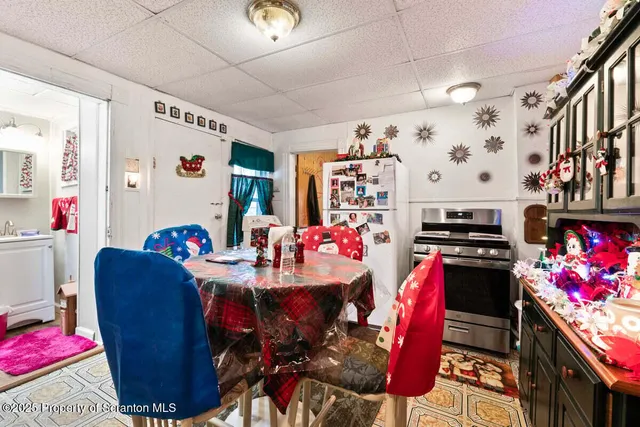 a bathroom with a sink a mirror and shower