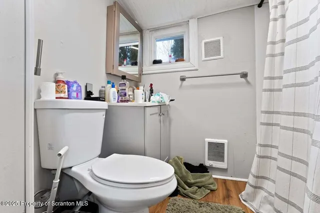 a kitchen with a stove and a microwave