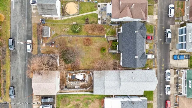 a kitchen with a white cabinets and white appliances