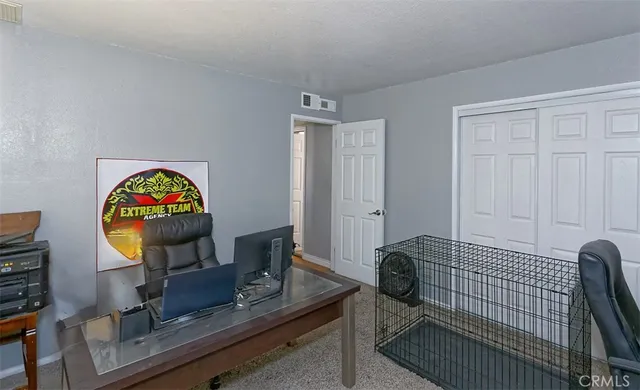 a view of workspace with a couch