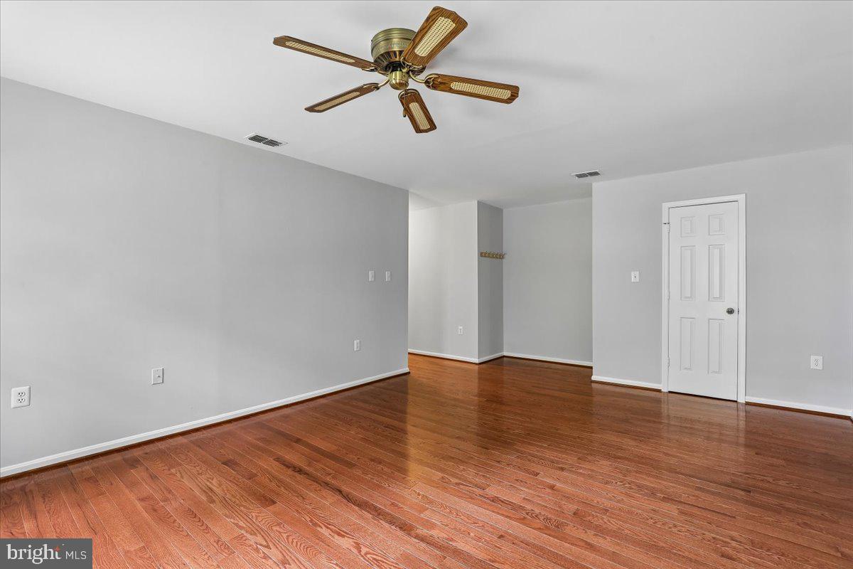 8253 Honeysuckle Road Manassas, VA 20112 - Photo 45 of 112 Primary Suite with warm wood floors.