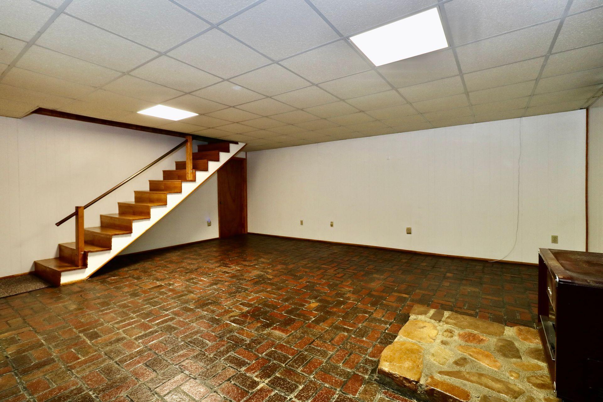 572 Arch Mill Road Buchanan, VA 24066 - Photo 26 of 48 Unique Brick Flooring