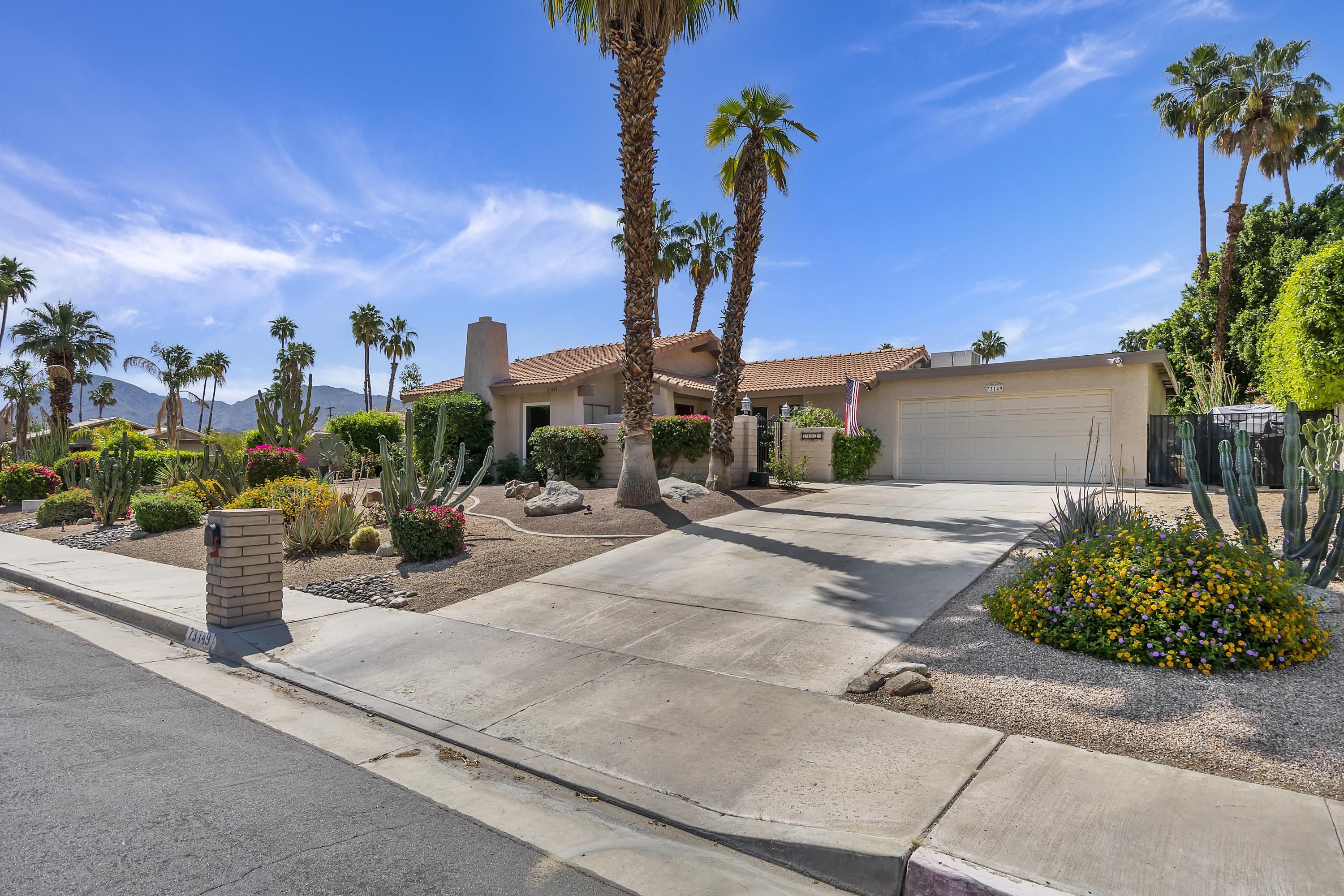 73149 Haystack Road Palm Desert, CA 92260 - Photo 2 of 32 front view of a house with a street