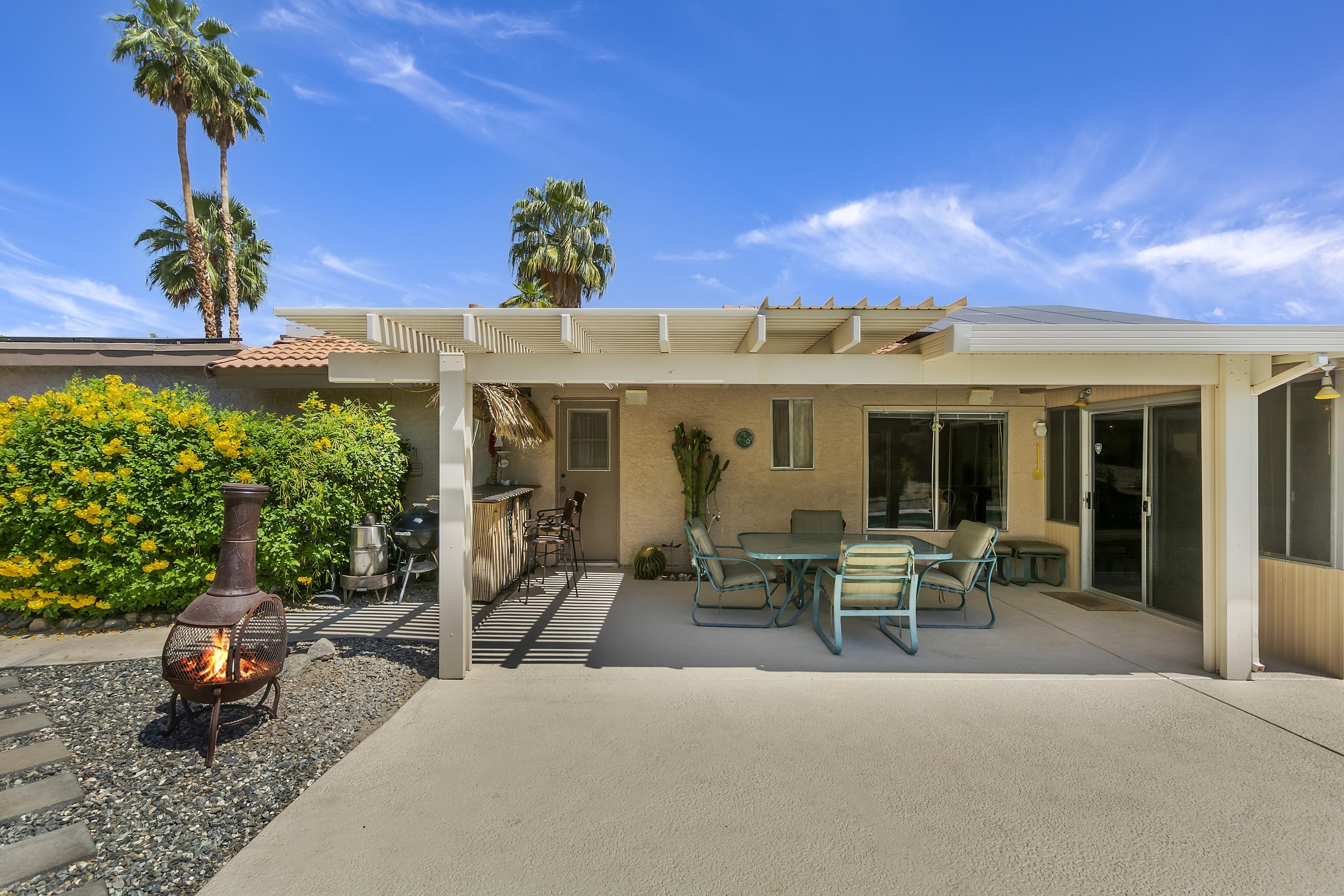 73149 Haystack Road Palm Desert, CA 92260 - Photo 26 of 32 a view of a house with patio