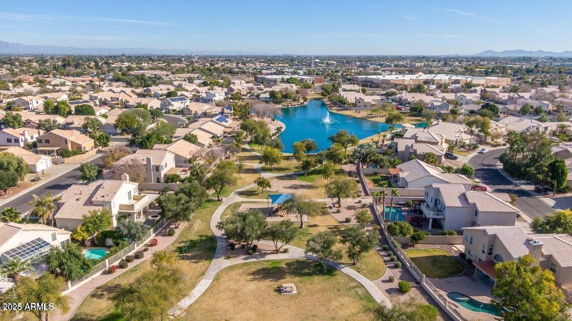 112 West Smoke Tree Road Gilbert, AZ 85233 - Photo 4 of 37 an aerial view of residential houses with outdoor space