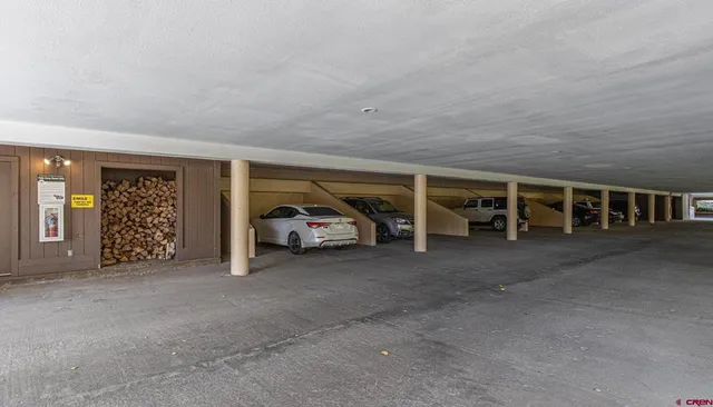 a view of a livingroom with furniture and window