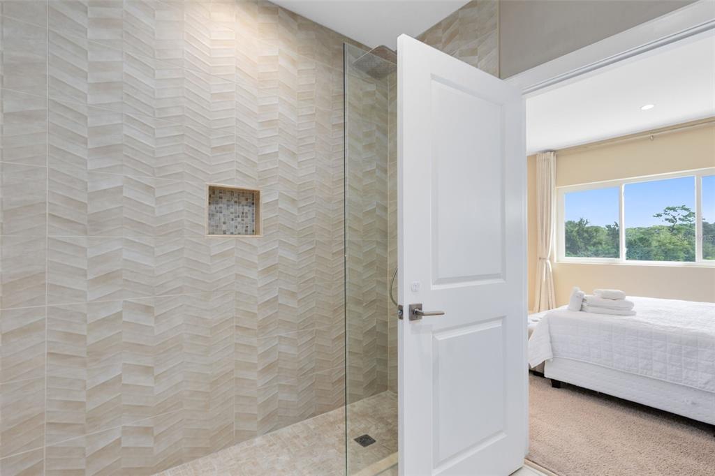 3061 Rockefeller Way Kissimmee, FL 34747 - Photo 15 of 38 a bathroom with a tub shower and a sink