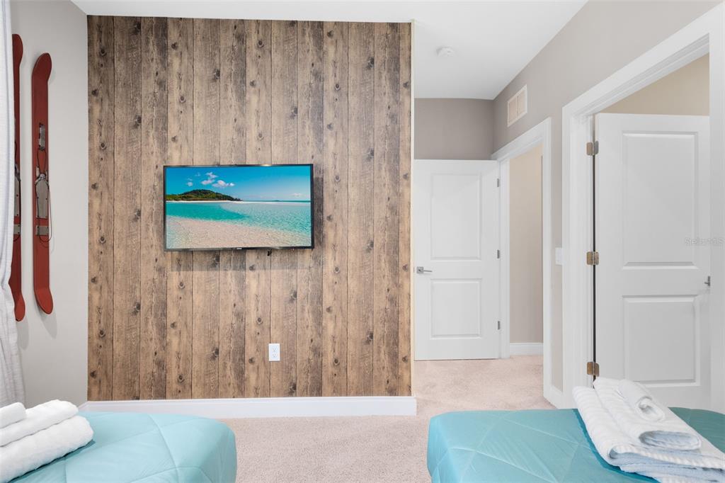 3061 Rockefeller Way Kissimmee, FL 34747 - Photo 24 of 38 a living room with furniture and a wooden floor