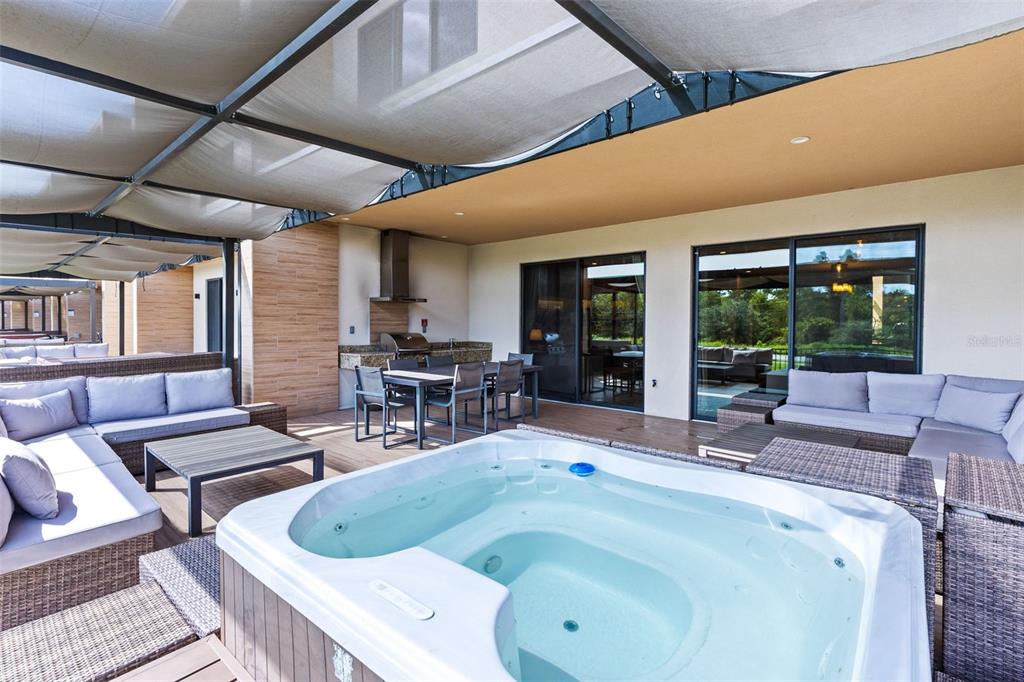 3061 Rockefeller Way Kissimmee, FL 34747 - Photo 30 of 38 a living room with furniture and large windows