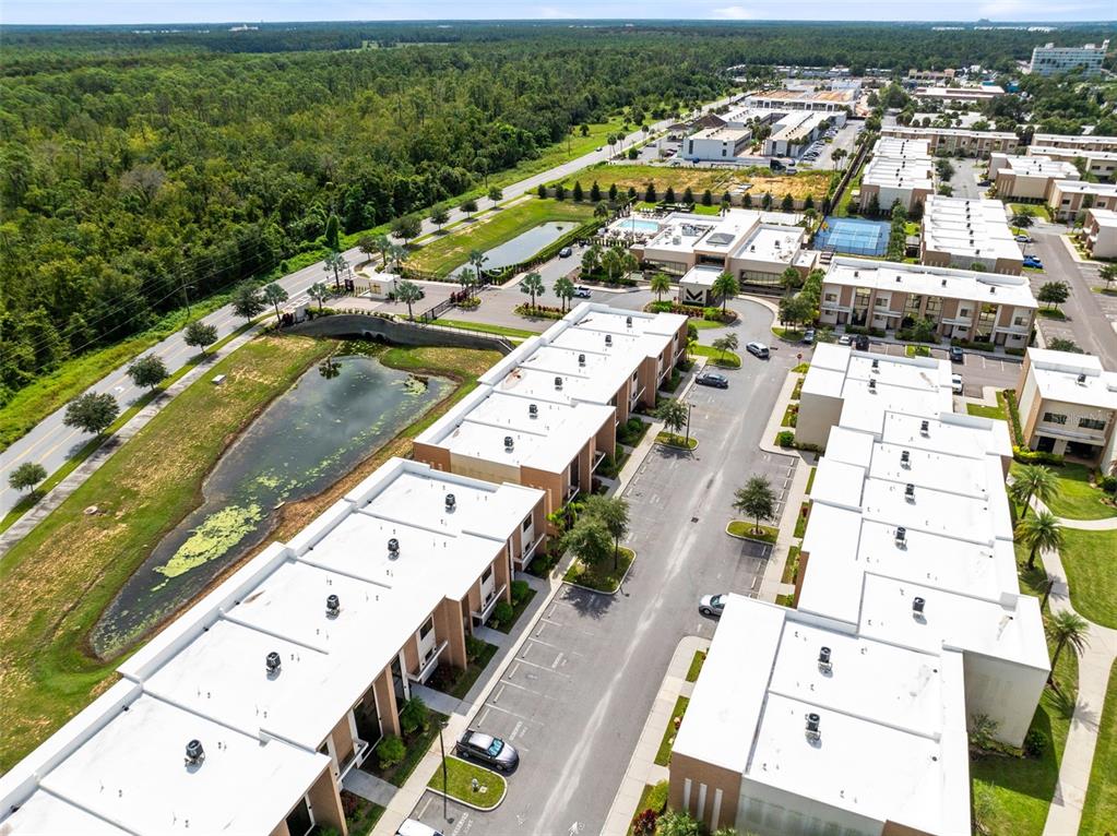 3061 Rockefeller Way Kissimmee, FL 34747 - Photo 34 of 38 an aerial view of a city with lots of residential buildings