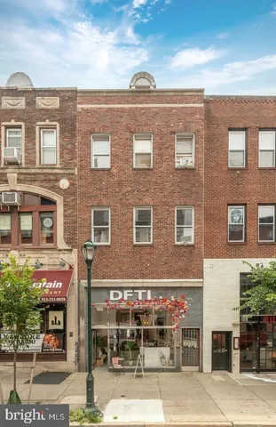 a front view of a building with street