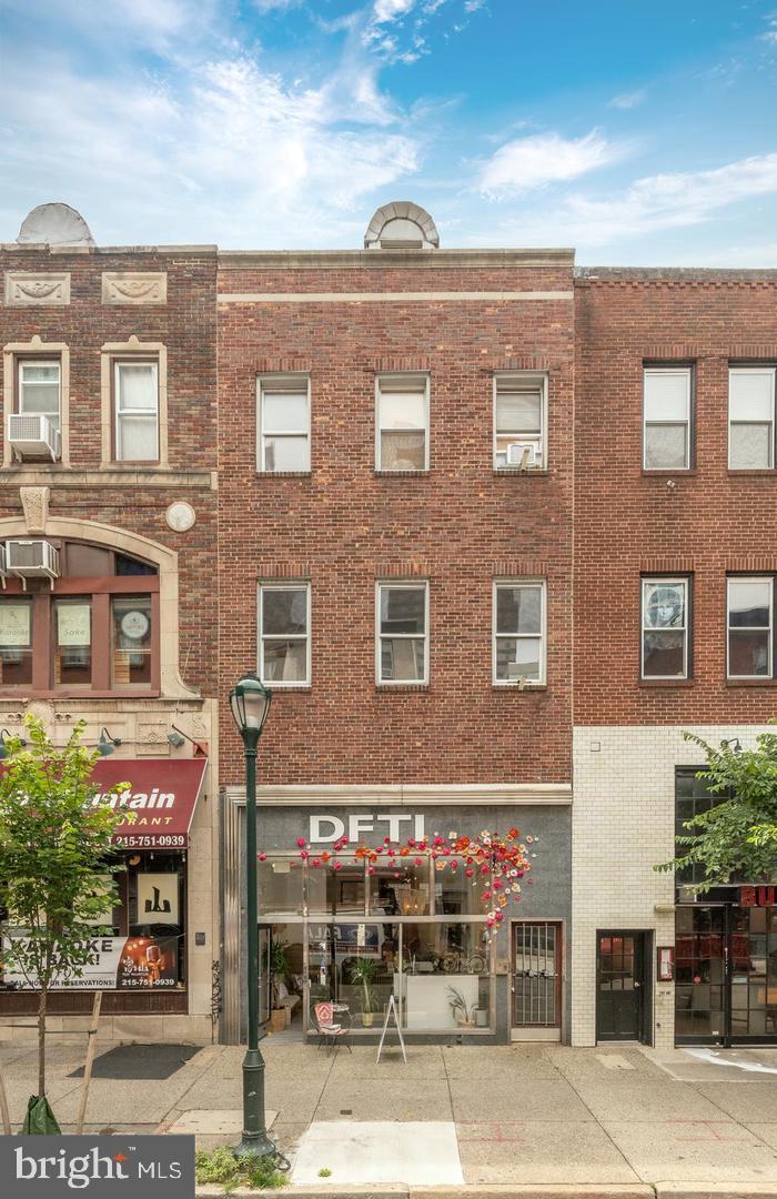 a front view of a building with street