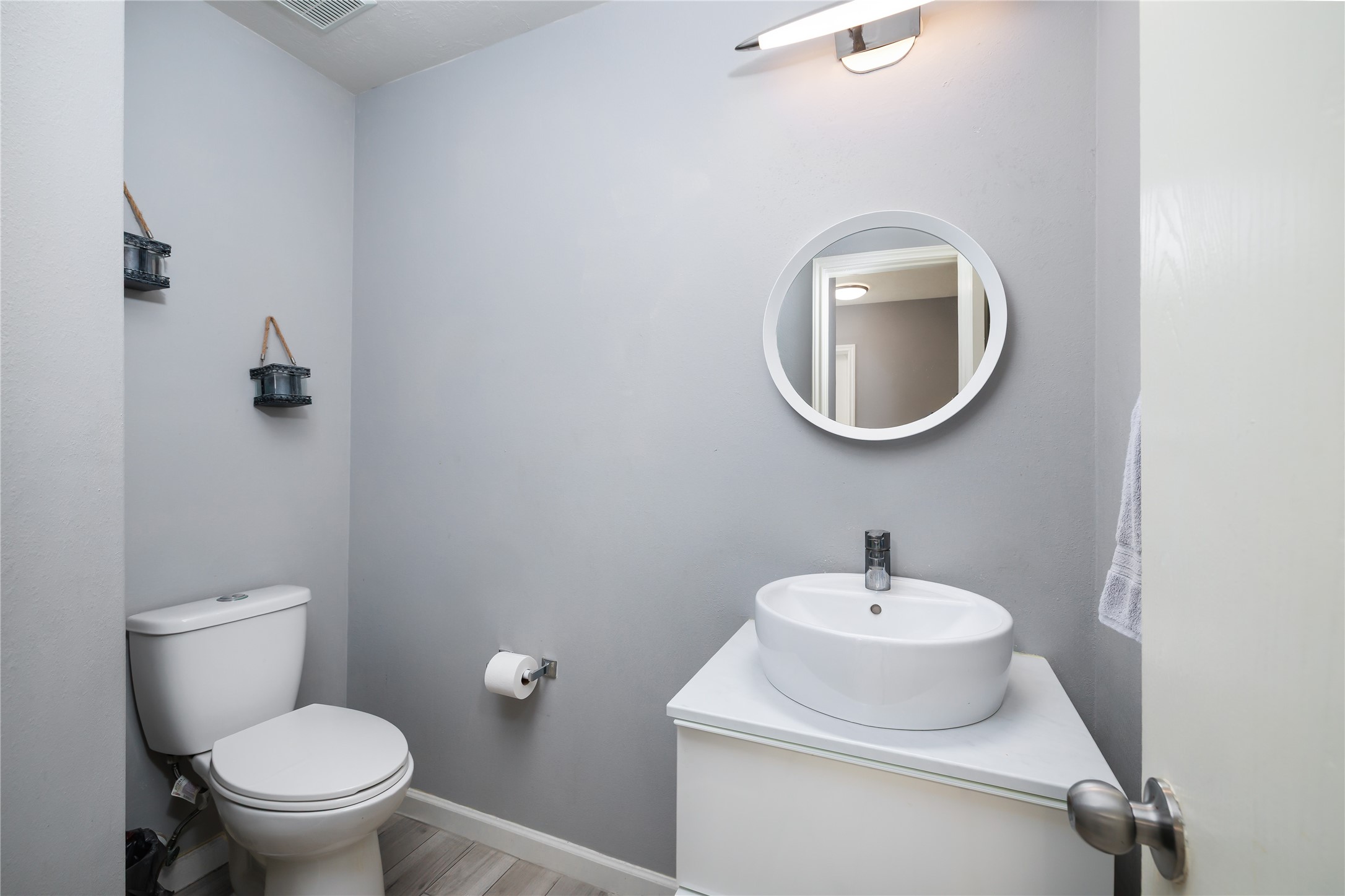 143 South Vesper Bend Circle Spring, TX 77382 - Photo 13 of 31 a white toilet sitting next to a bathroom sink