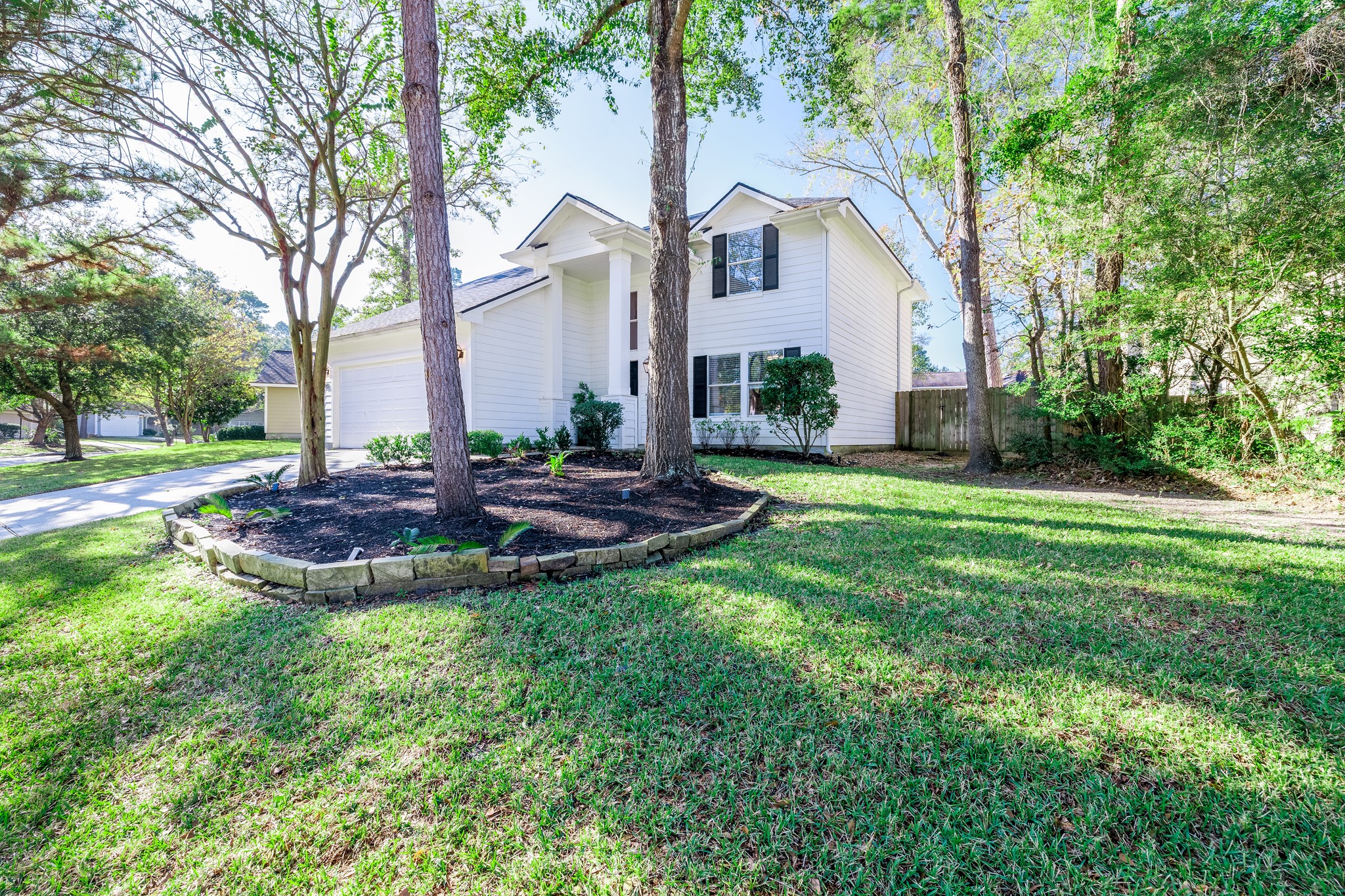 143 South Vesper Bend Circle Spring, TX 77382 - Photo 2 of 31 a view of a house with a yard and tree s