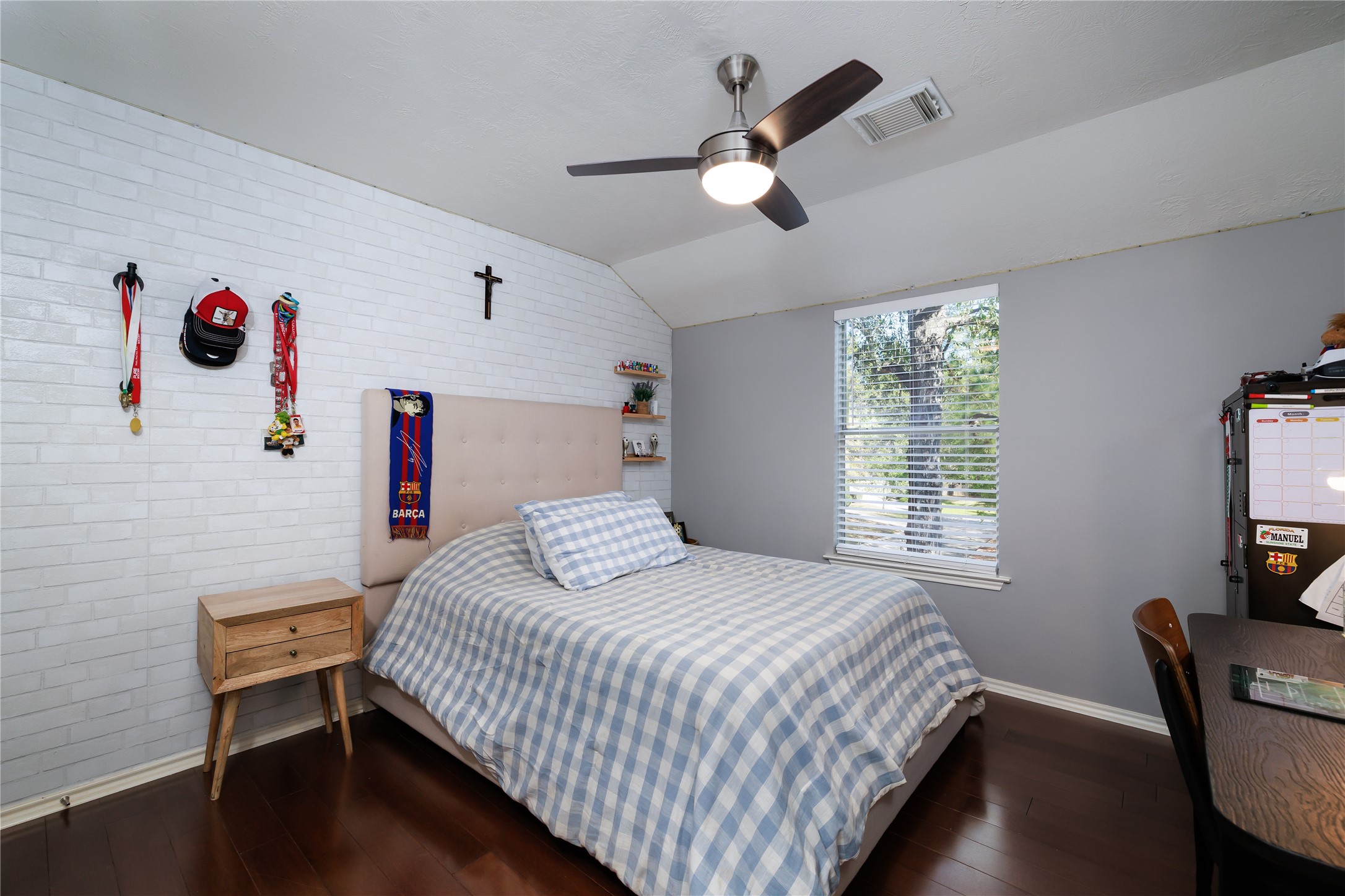 143 South Vesper Bend Circle Spring, TX 77382 - Photo 23 of 31 a bedroom with a bed and a chair