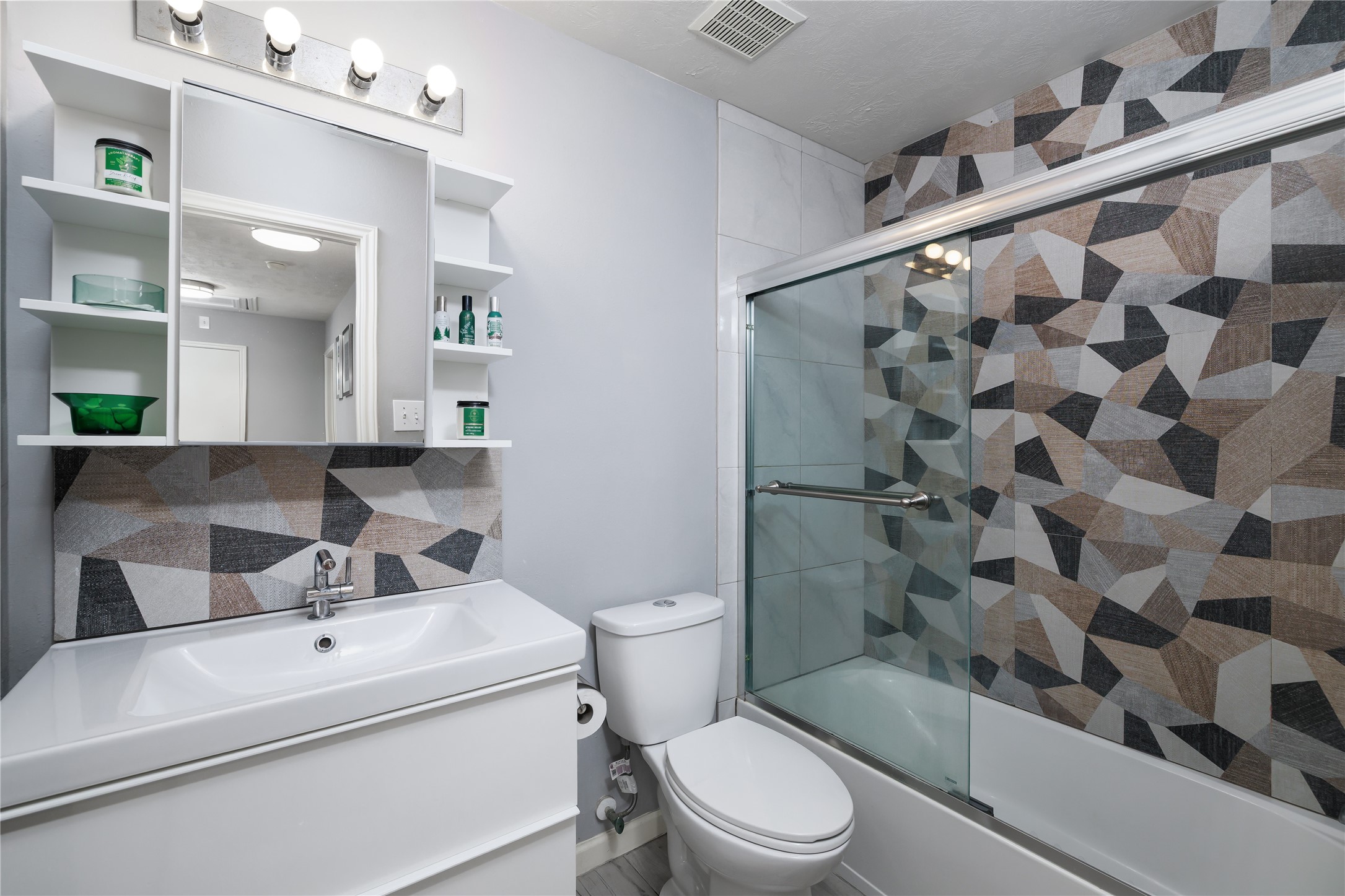 143 South Vesper Bend Circle Spring, TX 77382 - Photo 25 of 31 a bathroom with a sink toilet and shower