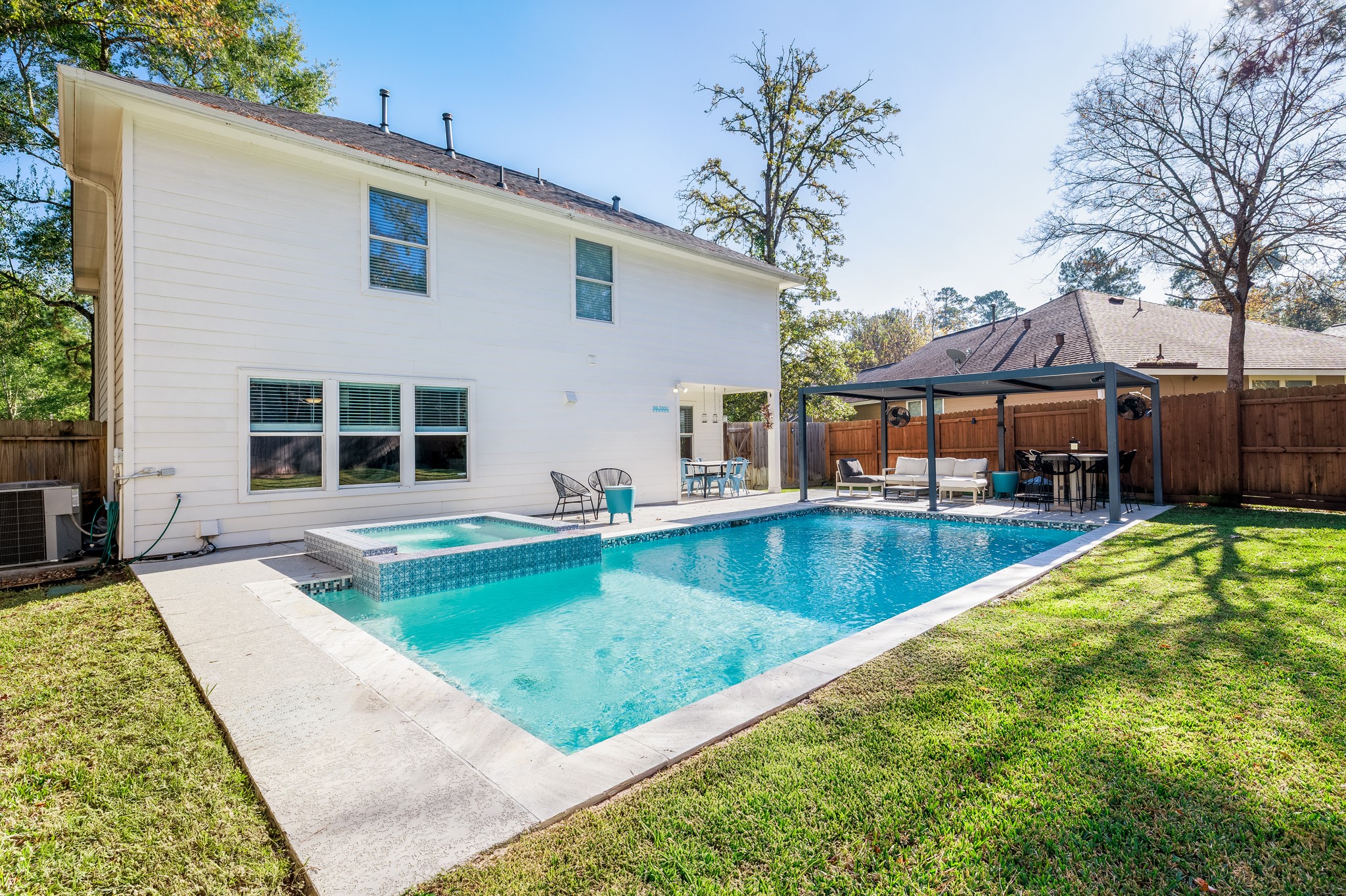 143 South Vesper Bend Circle Spring, TX 77382 - Photo 29 of 31 a view of a house with swimming pool in front of it