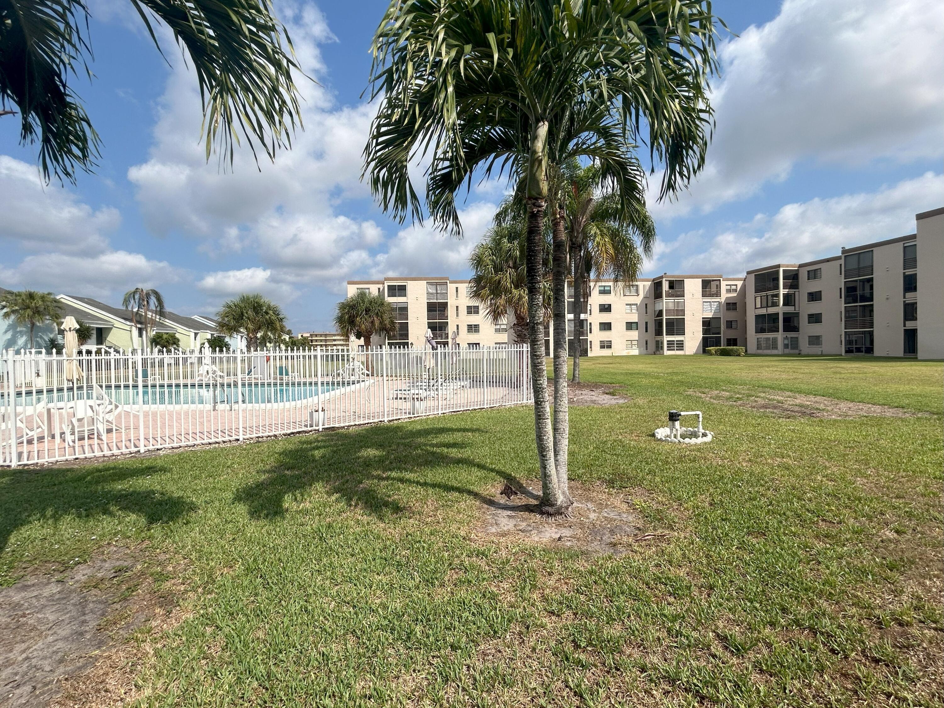 9300 Southwest 8th Street, Unit 216 Boca Raton, FL 33428 - Photo 24 of 31 Pool / Grounds
