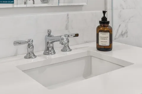 a bedroom with bed and window